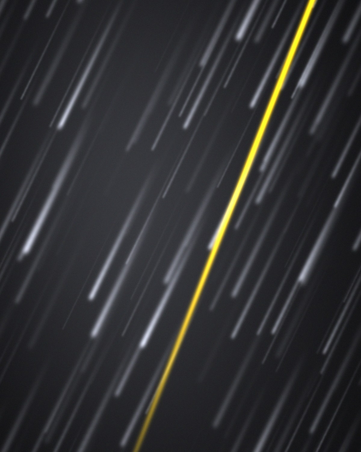 Abstract yellow movement line through a dark field